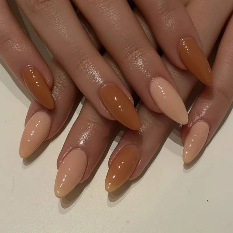 Cognac caramel and chocolate nude nail shade swatches on deep dark skin showing warm undertone neutral manicure options everyday