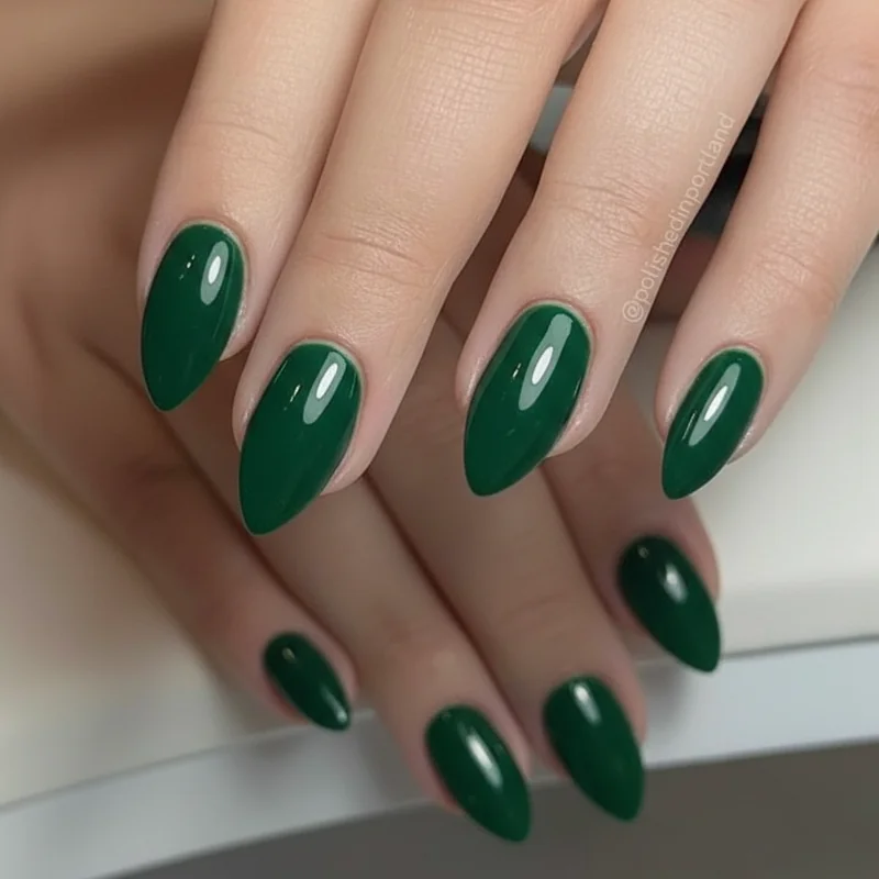 Color wheel showing red and green as complementary opposites with redhead nail swatches in emerald sage coral