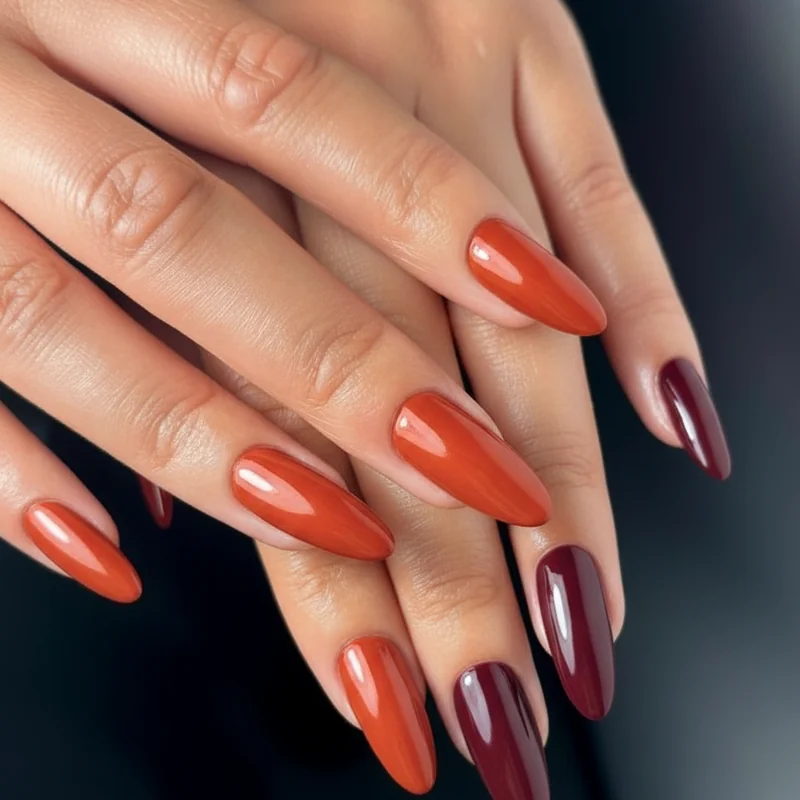 Warm orange red and cool wine nail swatches showing which red tones complement copper auburn and strawberry blonde hair
