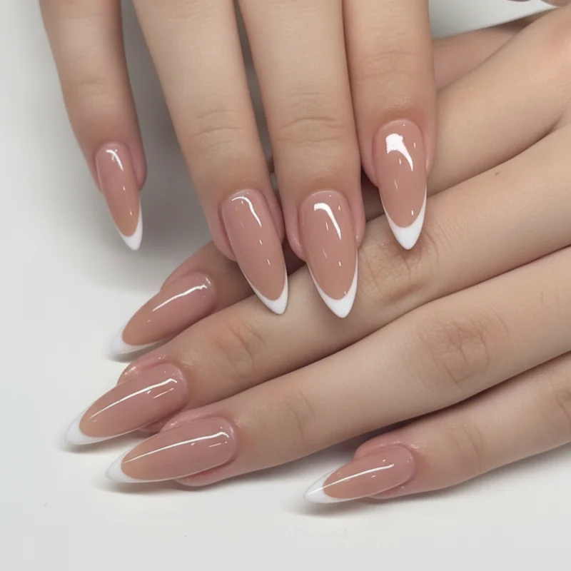 Hand with visibly wide healthy nail beds wearing a neutral polish in natural light