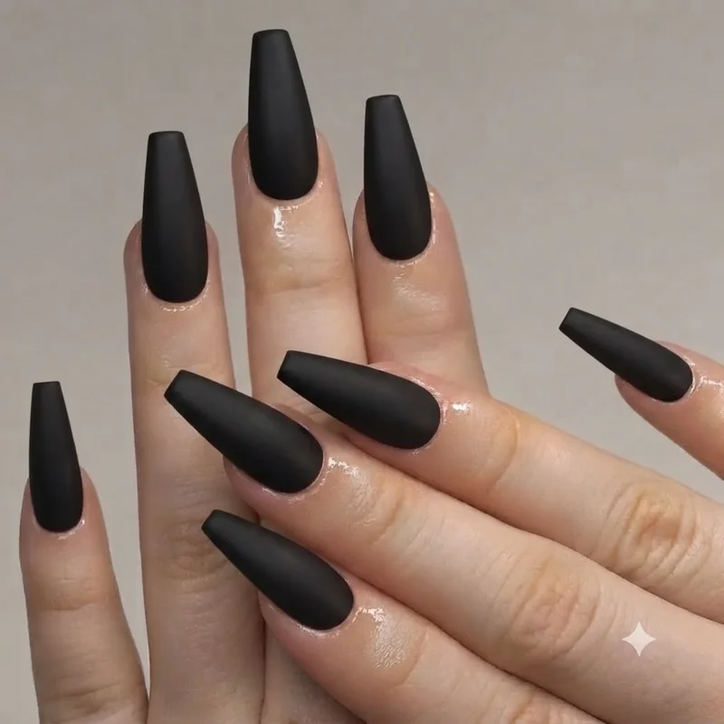 Close up of coffin ballerina nail shape manicure with tapered sides and flat squared tip