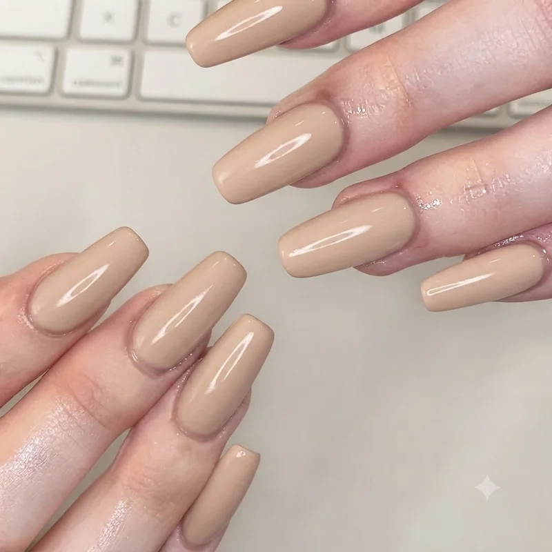 Classic duck nail set in a clean solid colour showing the wide flared free edge shape