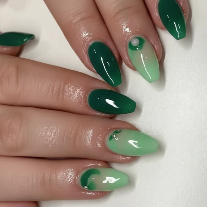 Green nails by nail shape guide showing short oval pistachio almond jade marble coffin emerald and stiletto chrome manicure styles