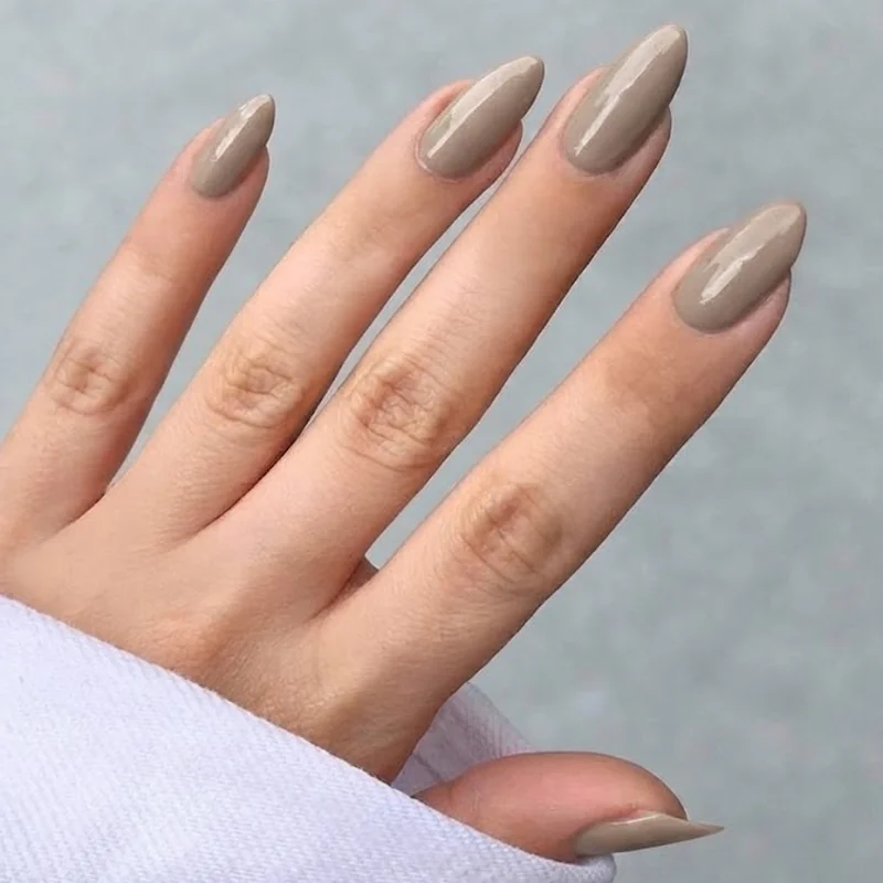 Neutral sporty gel manicure styled cleanly, pairing well with gym gloves or athletic tape for extra gym-day nail protection