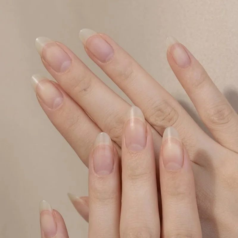 Polished oval nail shape final result with clean tapered tip and smooth sidewalls