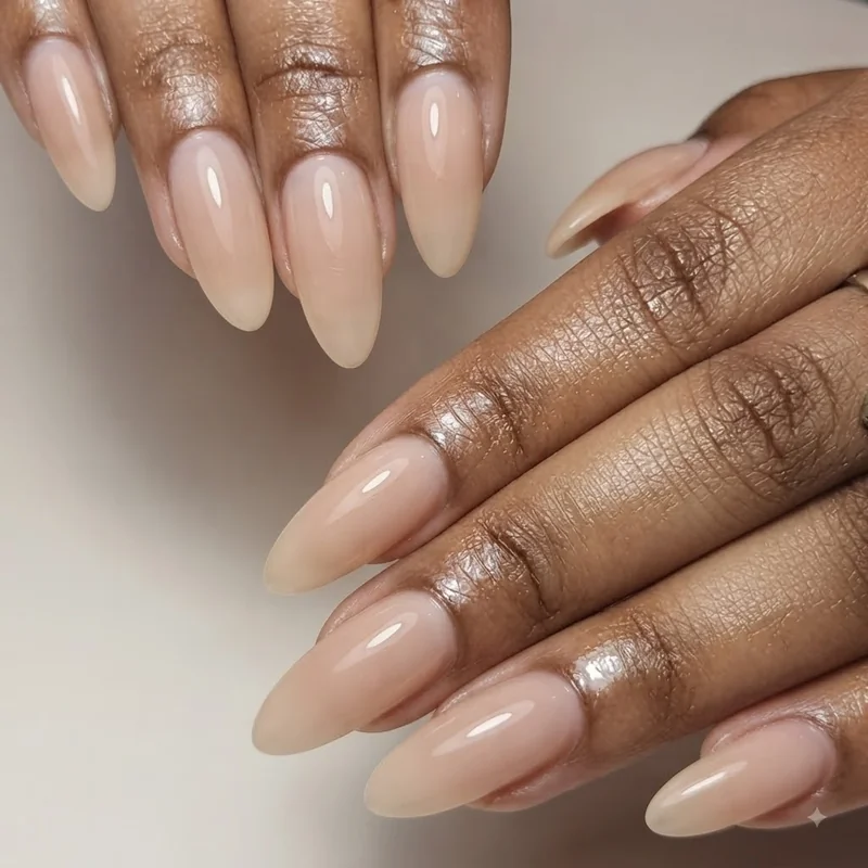 Gel manicure with minimal visible regrowth line shown close up near the cuticle area