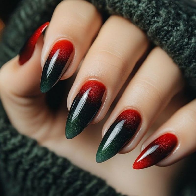 red to green ombre gradient christmas nails with vertical color blend on almond shape