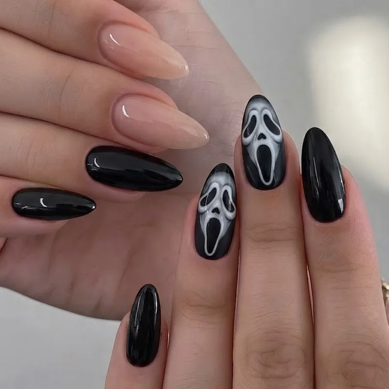 Black chrome scream nails with glossy Ghostface mirror finish manicure detail