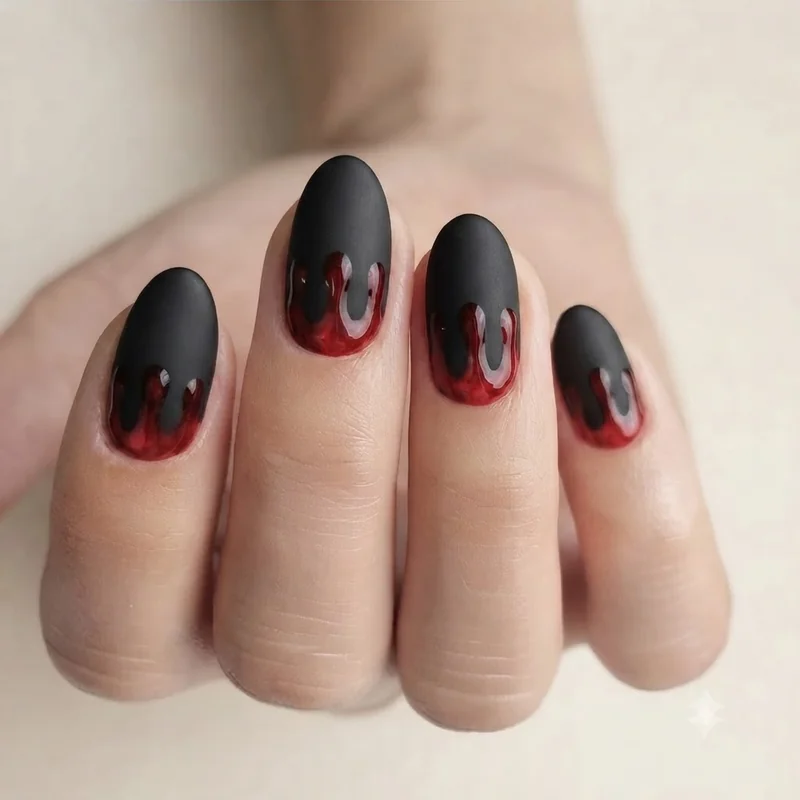 Easy beginner scream nails with stamped Ghostface accent on short almond nail shape