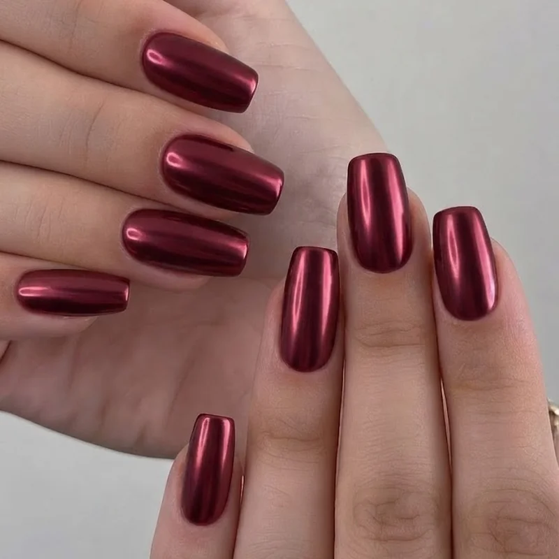 Bold short september nail design in a deep merlot chrome finish on a squoval shape