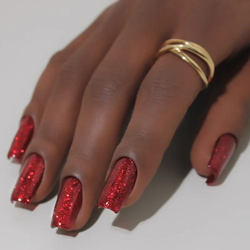 short christmas nails painted in deep burgundy wine red with glossy finish elegant holiday color