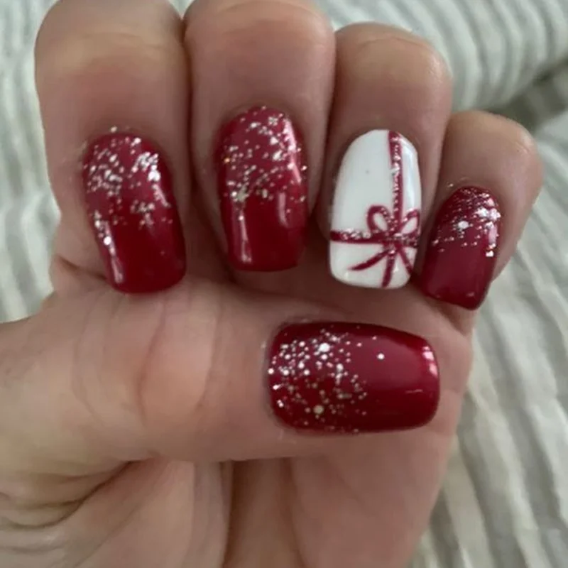 short christmas nails with gel polish being cured under UV lamp application tutorial for long lasting wear