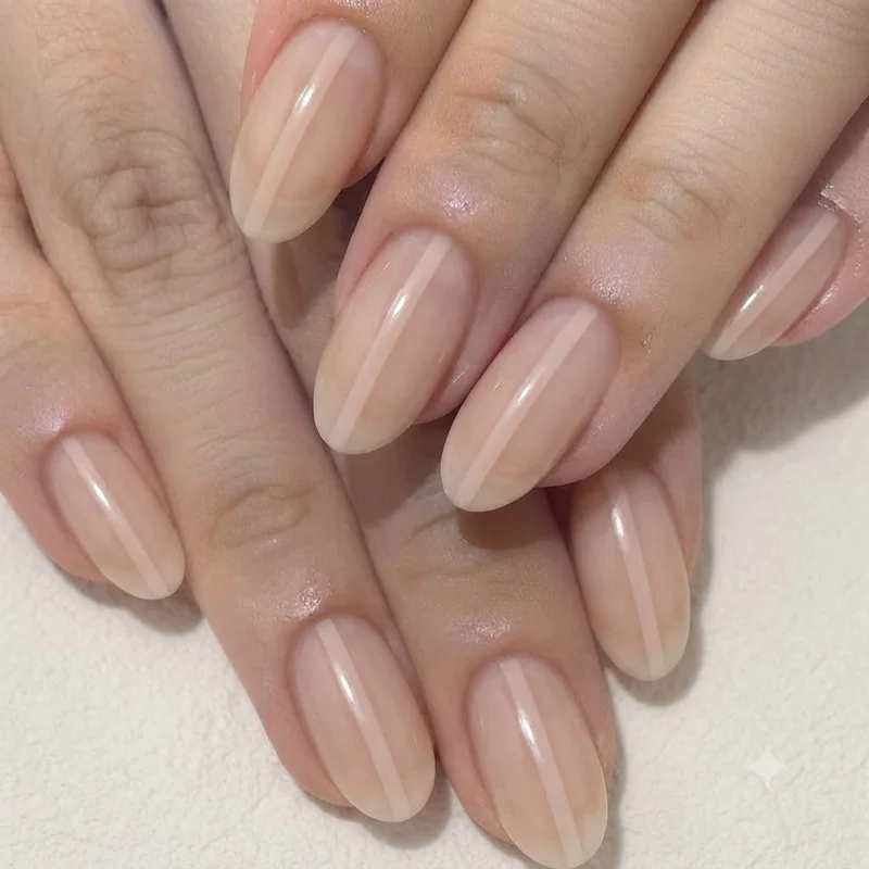 Negative space nail design for short nails with a vertical bare stripe that visually elongates the nail bed