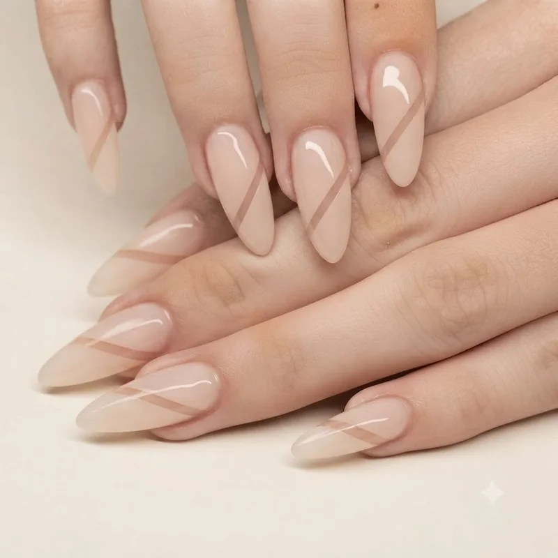 Simple negative space nail design with one diagonal bare stripe across a sheer nude polish base