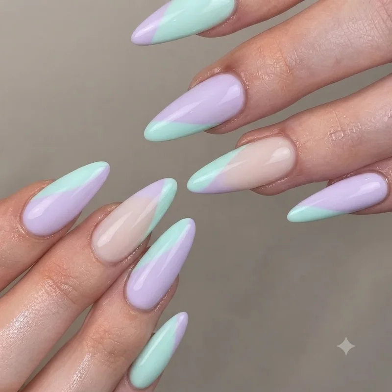 Finished zero-tool two-tone colour block manicure in soft pastel shades with a clean diagonal line