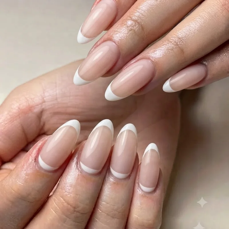 Negative space French tip manicure blending a simple technique with a minimalist finished aesthetic overall design look here
