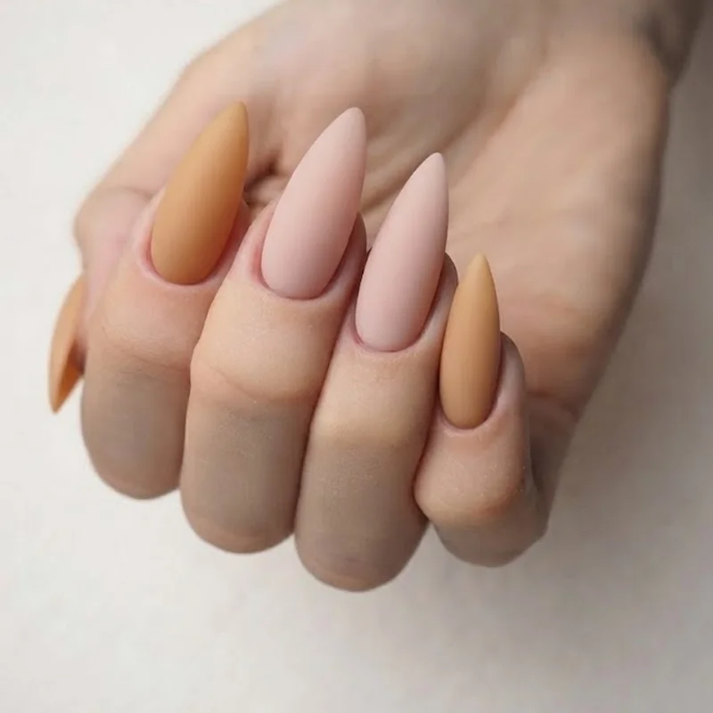 Stiletto nail art ideas showing a black and chrome French tip evolution on a sheer nude base