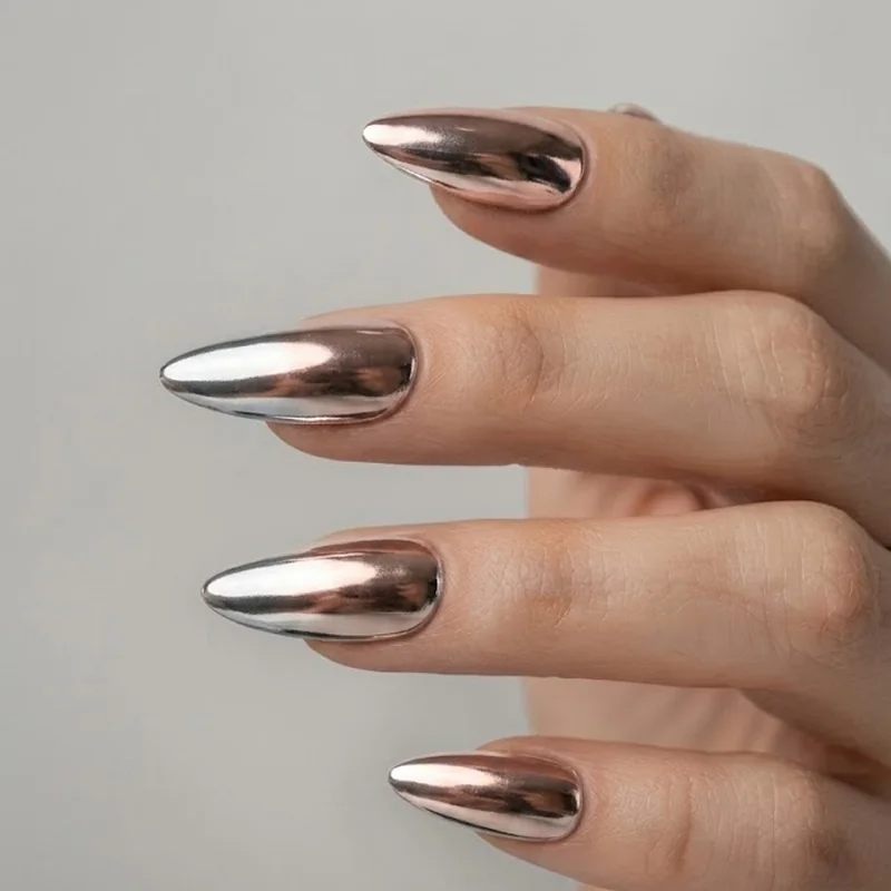 Bold stiletto nail designs in deep burgundy and jet black matte finish on a long dramatic set