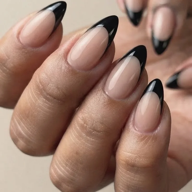 Chrome stiletto nails in rose gold and silver mirror finish on a dramatic long stiletto set