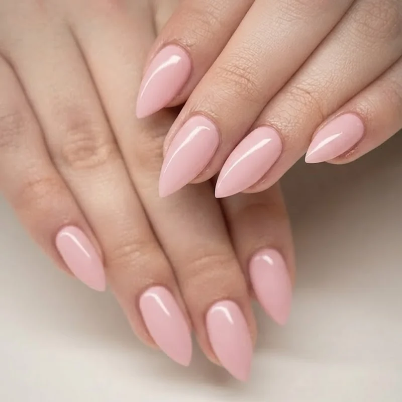 Stiletto nails ideas shown as a clean single-nail close-up of the classic sharp tapered point