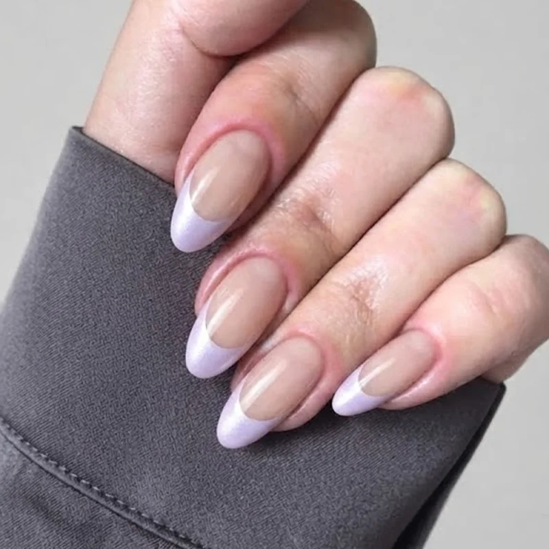 Bold crystal and 3D floral stiletto nails as a statement bridal manicure accent nail