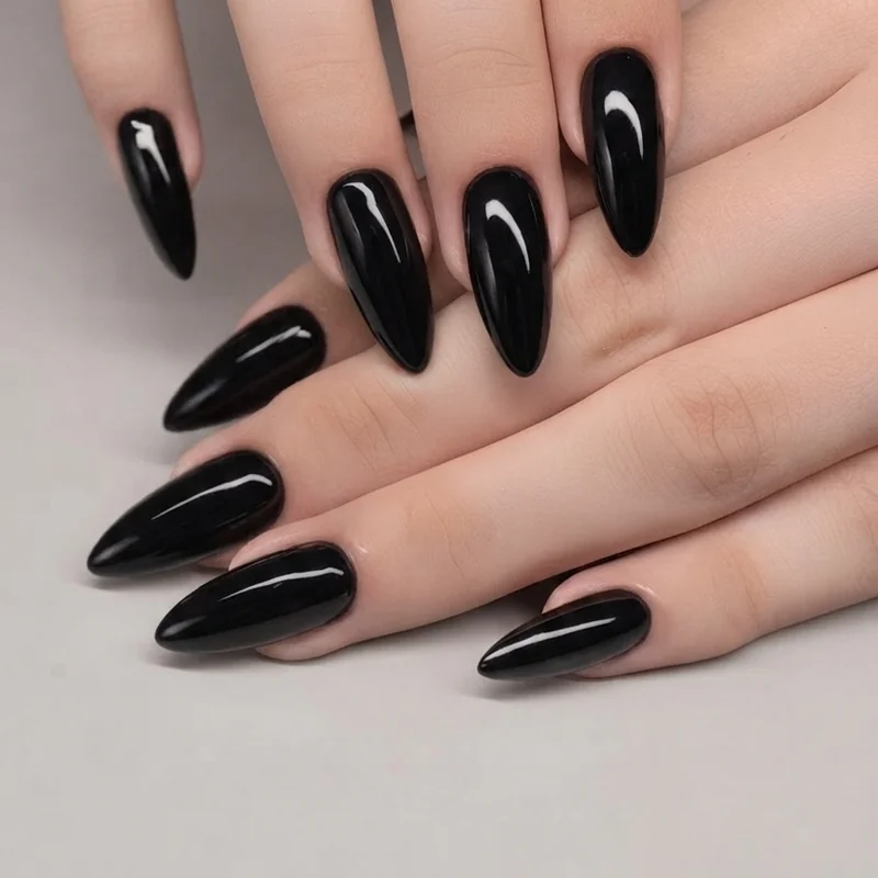 Ombre stiletto wedding nails showing a white to nude gradient French fade finish