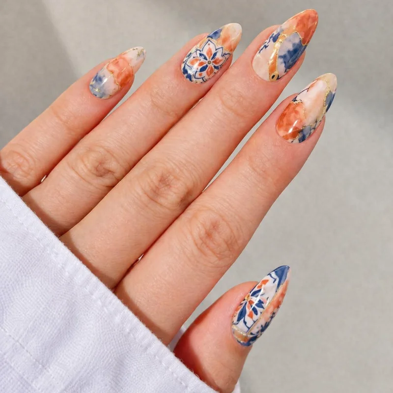 Beach and ocean nail art showing coastal wave gradient chrome blue shells pearl powder iridescent finish and sandy texture gel techniques