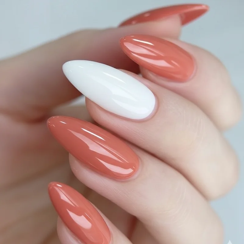 Universal summer nail colours flat-lay showing warm coral milky sheer white and terracotta polish bottles flattering all skin tones