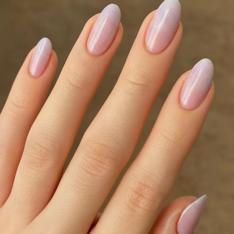 Glazed doughnut chrome evolved summer nail aesthetic 2026 pearl luminous powder finish on coffin and almond nails