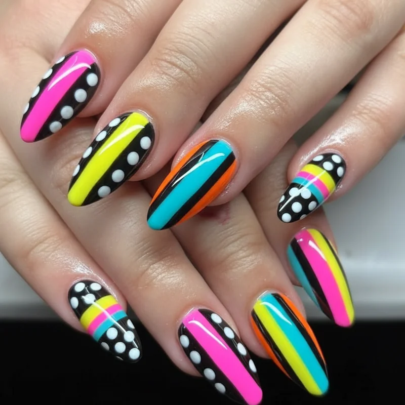 Polka dot and striped nail ideas summer 2026 bold colour combinations graphic pattern on short and medium nails