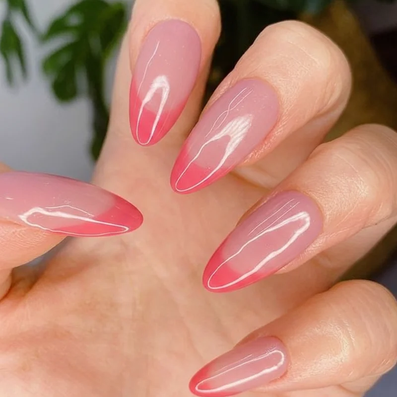 Sheer nail ideas summer 2026 glass finish translucent pink coral and lavender polish on almond and squoval shapes