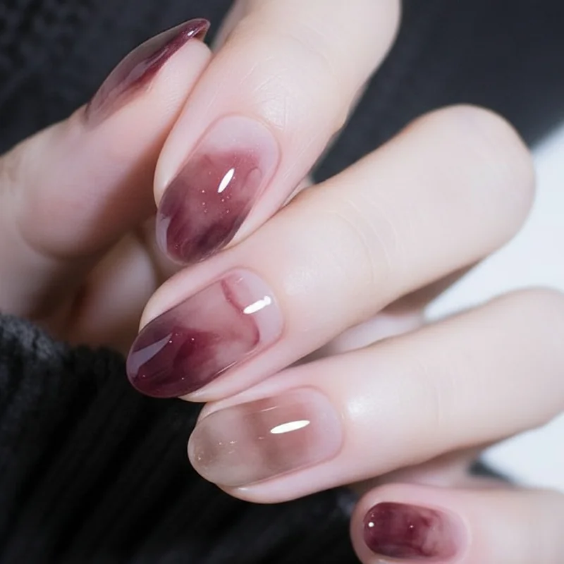 Jelly sheer smoky nail translucent berry foggy neutral hazy taupe glassy texture grown-up summer 2026 nail finish