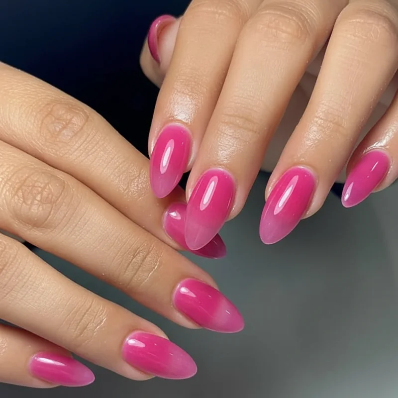 Syrup nails versus jelly nails comparison showing gradient diffused finish on left and bold uniform translucent candy colour on right hand