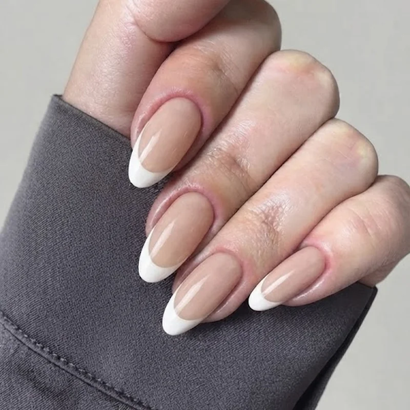 Minimalist milky soap nail manicure styled to reflect the hidden meaning theory around taylor swift's engagement look