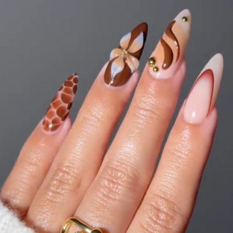 Thanksgiving nails on long almond shaped nails with intricate fall art