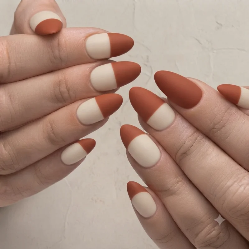 Burgundy and brown French tip manicure variation on cream base for Thanksgiving 2026
