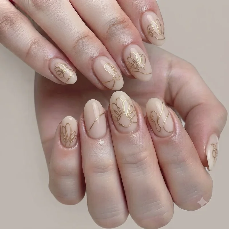 Warm cranberry and burnt orange fall manicure with gold chrome accent nail for 2026
