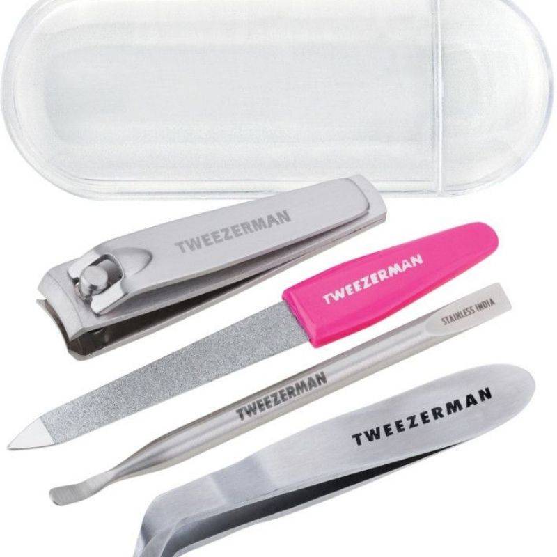 Vacation nails travel kit with essential products for maintaining manicure on trips