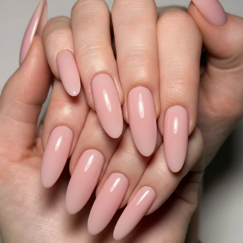 At-home gel nail kit with UV LED lamp, HEMA-free gel polish bottles, and base coat laid out for a bridal manicure session