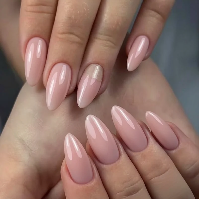 Emergency nail repair kit with clear topcoat, nail glue, mini nail file, and cuticle oil bottle prepared inside a bridal bag