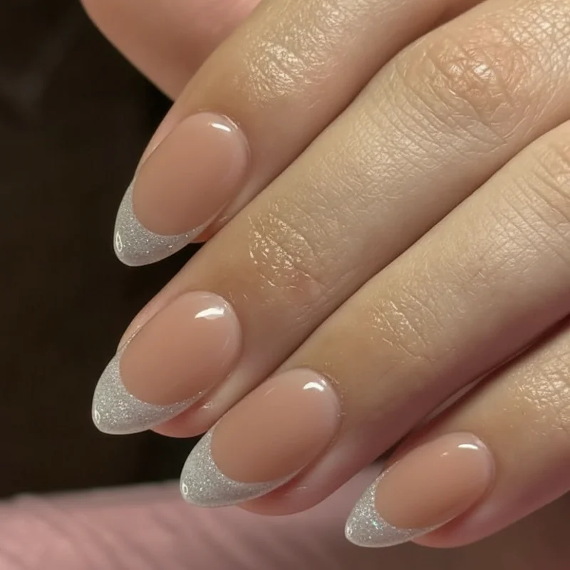 Six-week bridal nail conditioning routine showing cuticle oil and nail strengthener products laid on a clean white surface