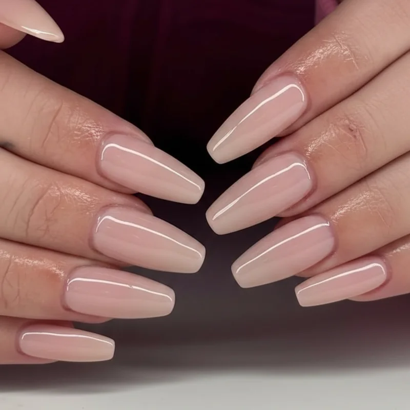 BIAB builder gel structured gel bridal nail overlay showing natural pink finish and uniform thickness applied over natural nail before curing