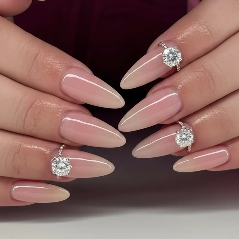 Nail shape engagement ring pairing guide showing squoval with emerald cut oval with solitaire and almond with pear shaped ring