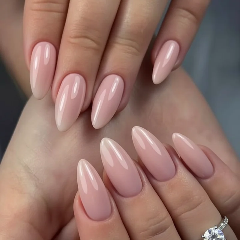 Ring shot nail shape photography showing almond nails with solitaire engagement ring framing guide for wedding day close-up photos