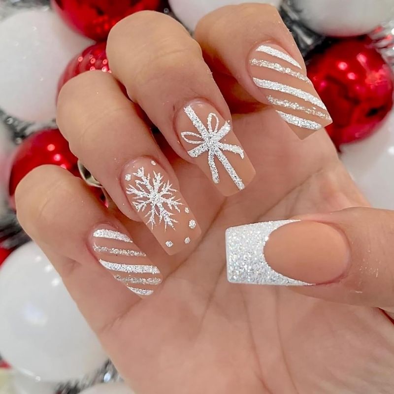 white matte christmas nails with silver snowflake decals minimalist winter design on short square nails