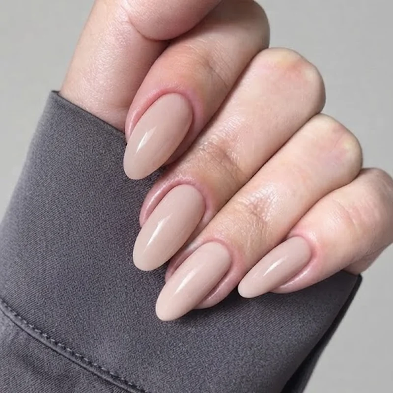 Soft blush nude manicure alternative styled as a wedding guest nail option for the two exception cases covered in this guide