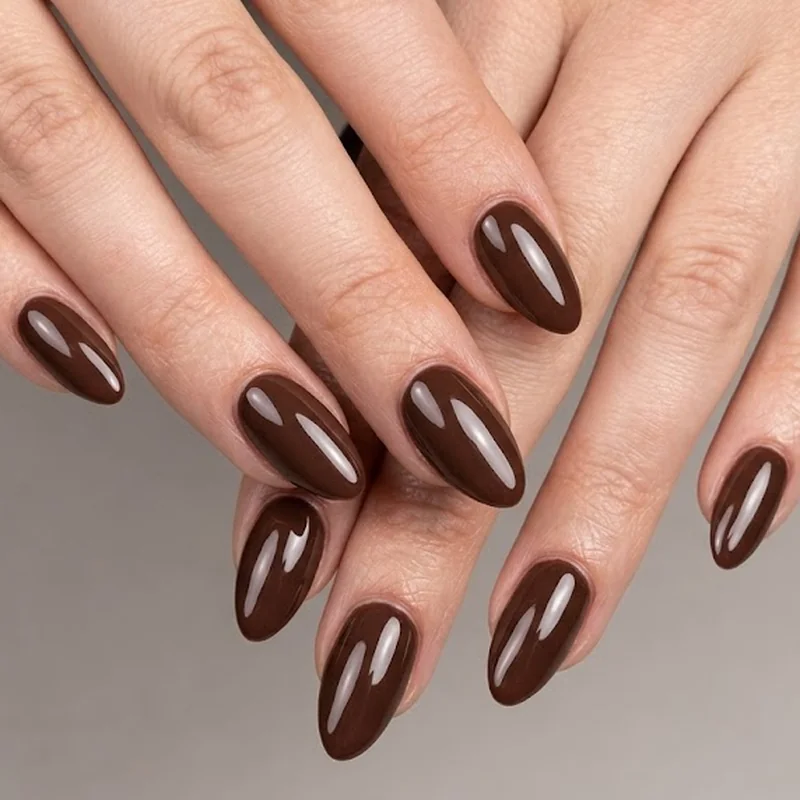 Frosted white silver French tip on almond nails over a nude sheer base