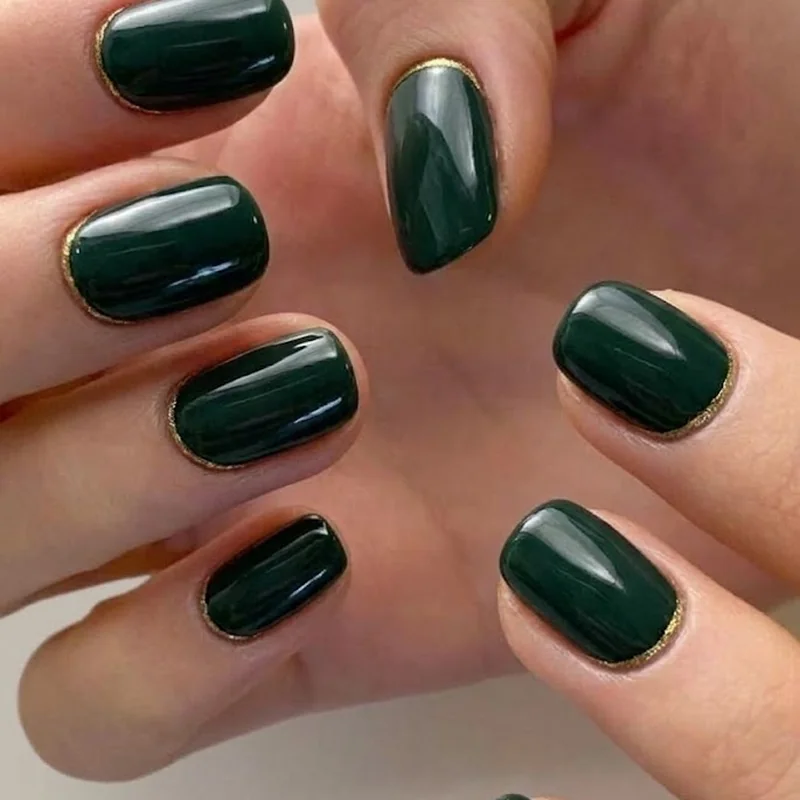Moody dark academia winter nails styled in a candlelit library setting for 2026