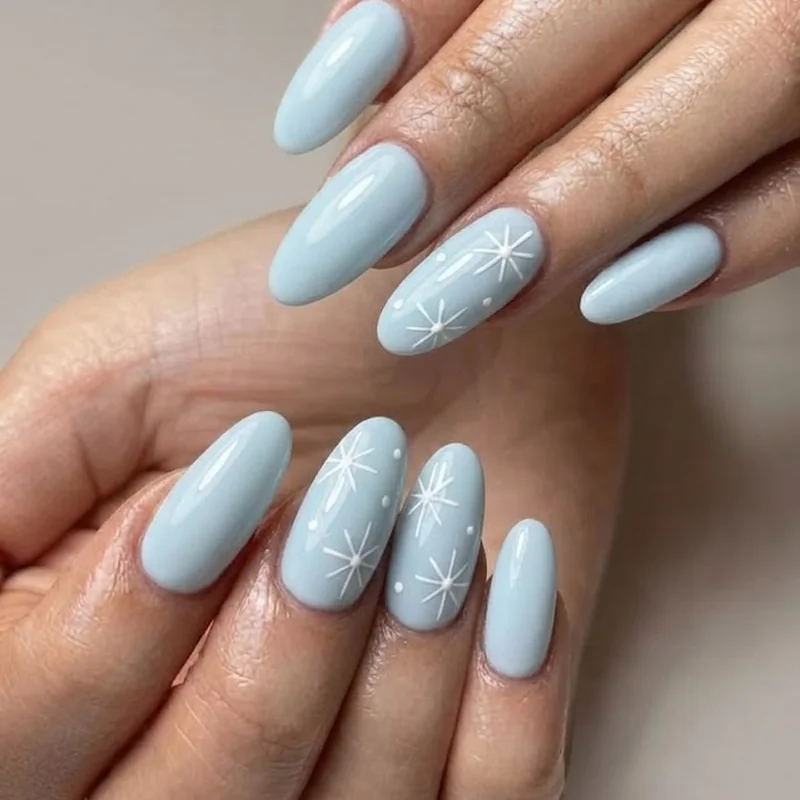 Metallic silver French tip manicure on a nude base showing beginner winter nail art technique