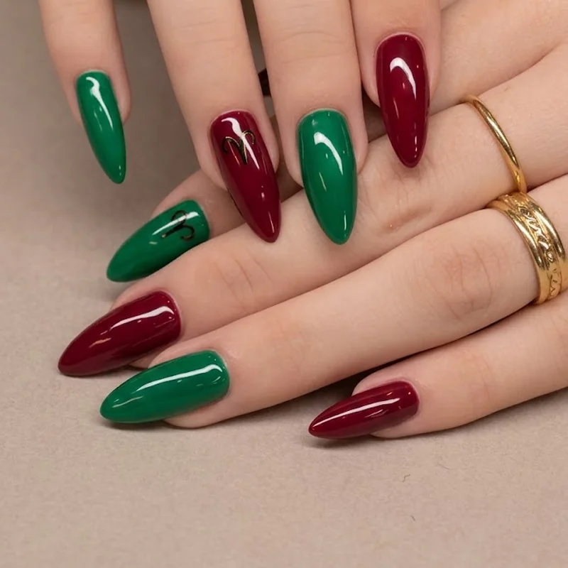 Old money winter nails in glossy emerald and burgundy for a holiday party, paired with gold jewelry and a sweater